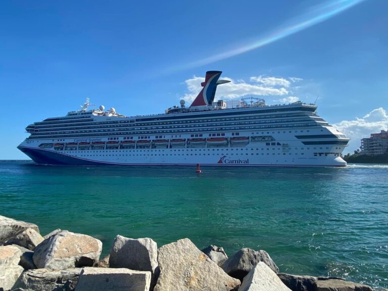 A Carnival Cruise ship docked at a cruise port