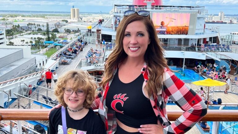 A woman and her daughter pose on a Carnival crise ship docked at Port Canaveral in Florida