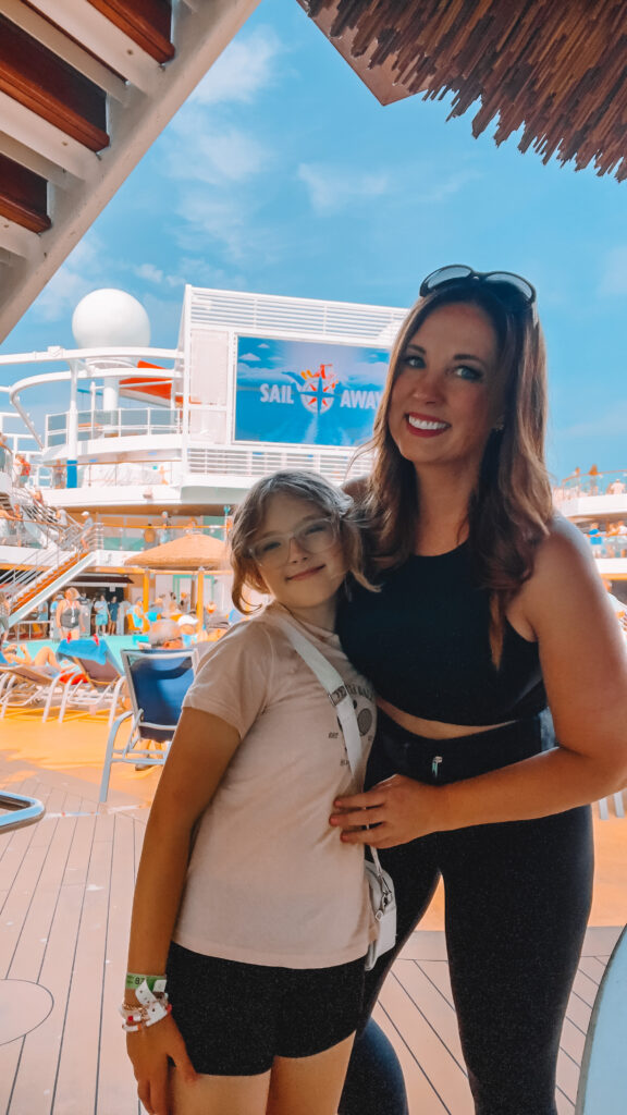 A woman and her daughter pose on the lido deck of a Carnival cruise ship docked in Galveston, Texas 